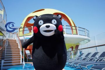 A person in a black bear garment Description automatically generated