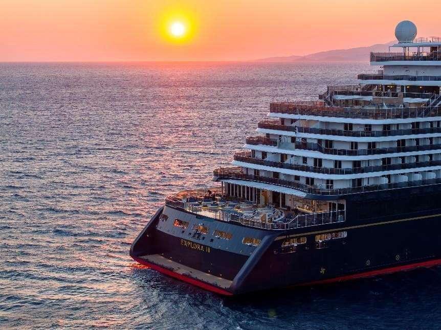 A large cruise ship in the water

Description automatically generated