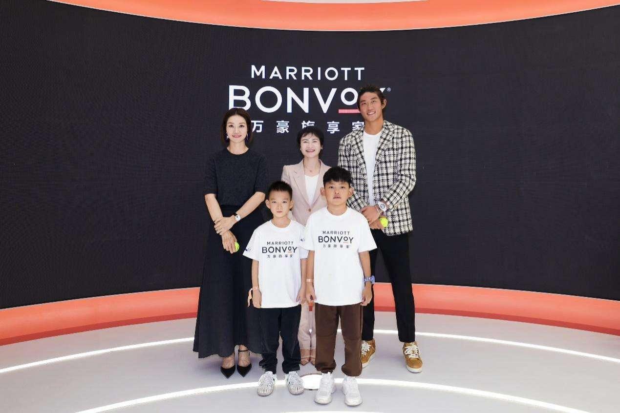 A group of people posing for a photo Description automatically generated