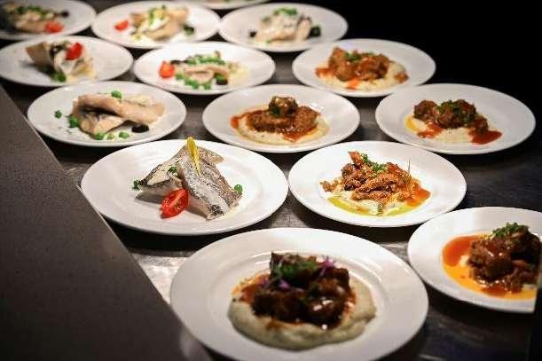 A group of plates of food Description automatically generated