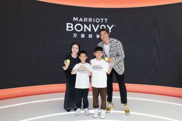 A group of people posing for a picture Description automatically generated