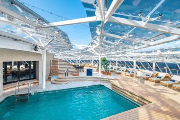 A pool inside a building Description automatically generated