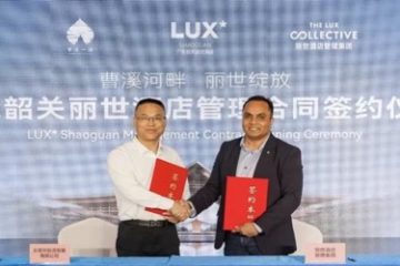 A couple of men shaking hands AI-generated content may be incorrect.